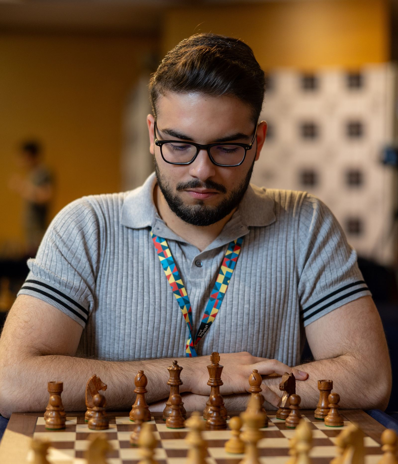 João Guilherme Matos working through a position with a player at the board
