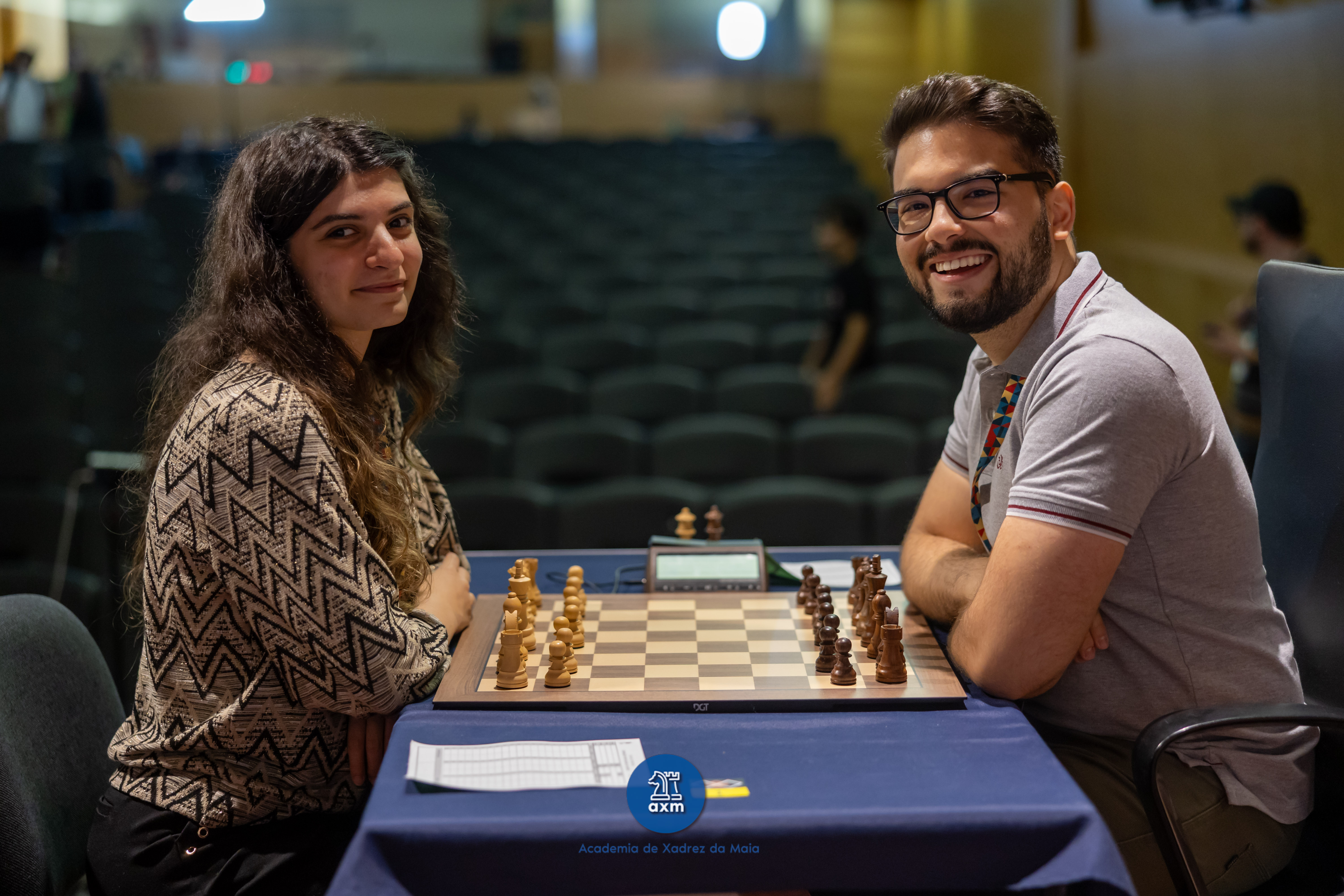 João Guilherme Matos with Anna-Maja, chess player and streamer, at the board during a tournament