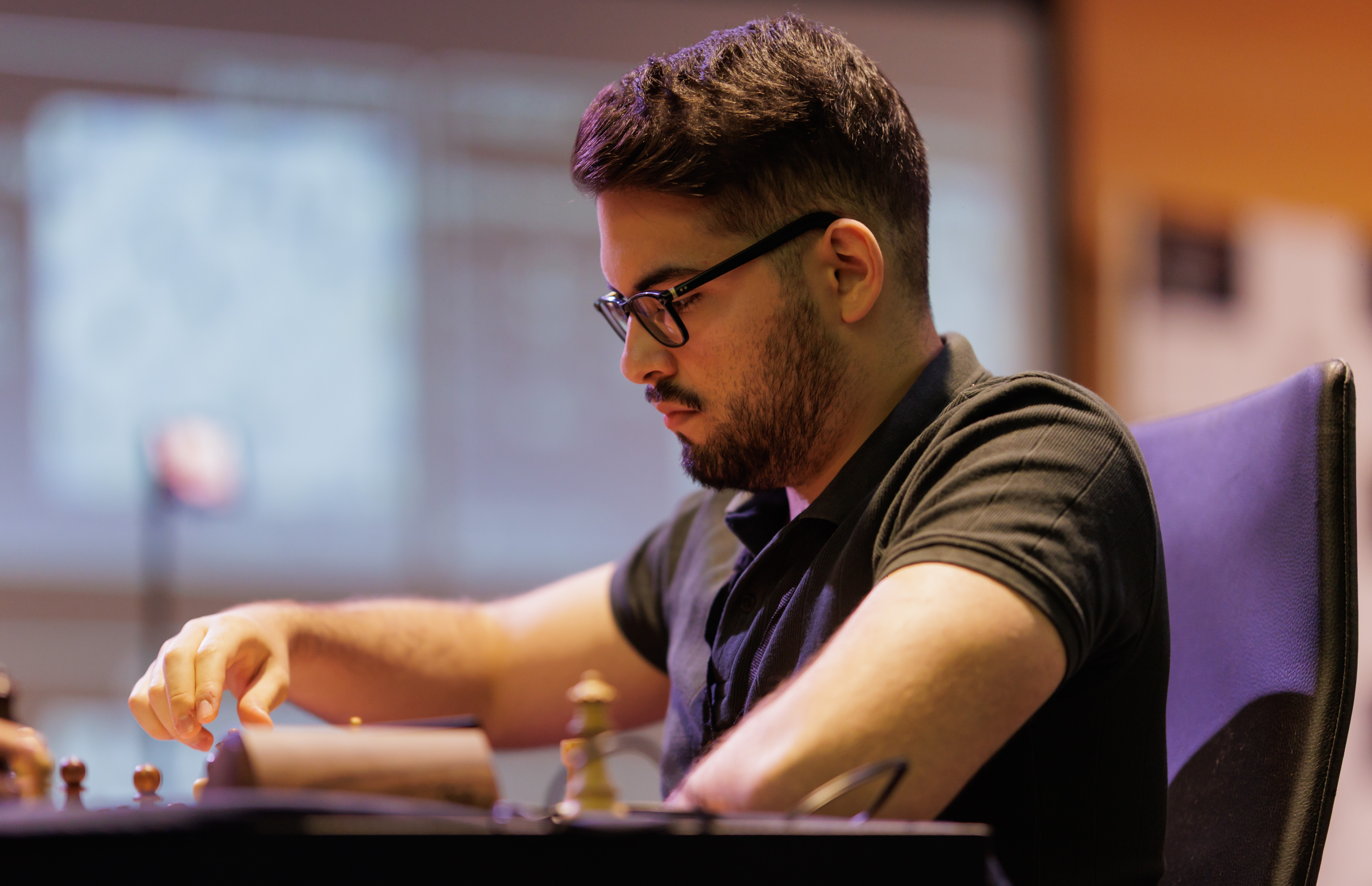 João Guilherme Matos concentrating during a competitive tournament game